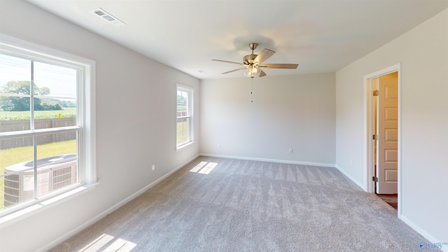 209 Roman Randall Rd, New Market, AL 35761 - spare room featuring light carpet, baseboards, a ceiling fan, and visible vents