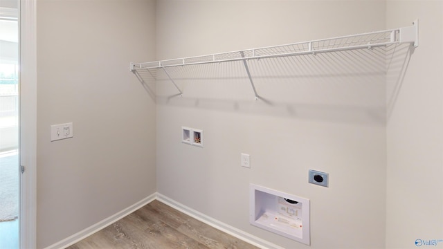 209 Roman Randall Rd, New Market, AL 35761 - clothes washing area featuring baseboards, laundry area, wood finished floors, electric dryer hookup, and hookup for a washing machine