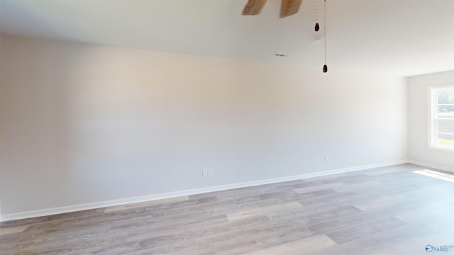 209 Roman Randall Rd, New Market, AL 35761 - spare room featuring ceiling fan, light wood finished floors, baseboards, and visible vents
