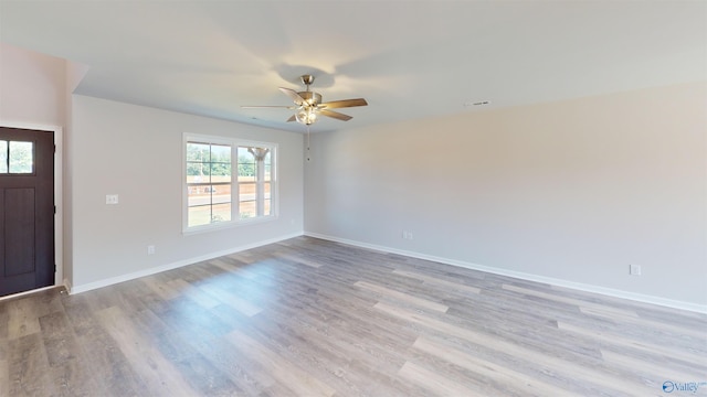209 Roman Randall Rd, New Market, AL 35761 - foyer entrance with light wood-style floors, baseboards, a ceiling fan, and plenty of natural light