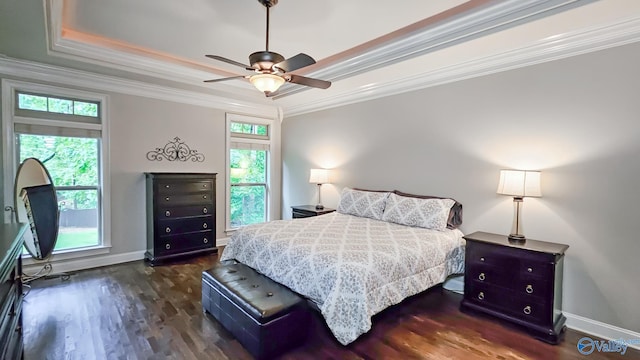 10 Verdant Cir SE, Huntsville, AL 35803 - bedroom with crown molding, a tray ceiling, dark wood finished floors, baseboards, and a ceiling fan