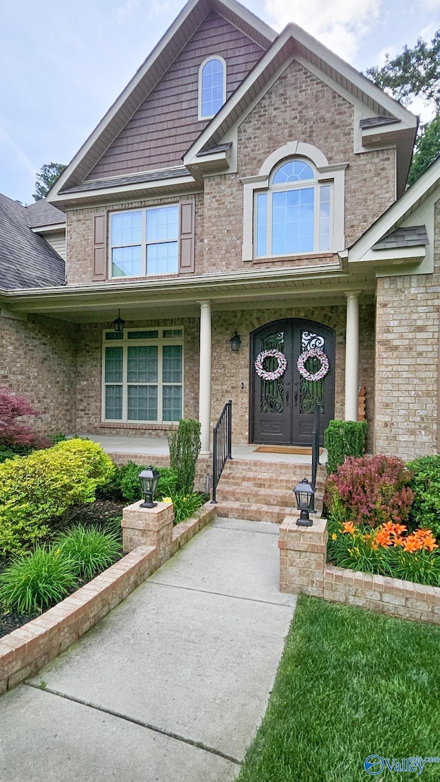 10 Verdant Cir SE, Huntsville, AL 35803 - property entrance featuring brick siding and covered porch
