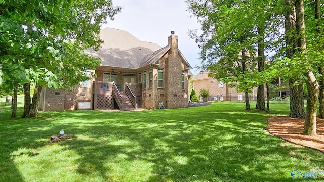 10 Verdant Cir SE, Huntsville, AL 35803 - rear view of house with stairs, brick siding, a chimney, a ceiling fan, and crawl space