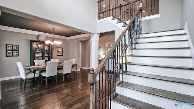10 Verdant Cir SE, Huntsville, AL 35803 - dining space featuring baseboards, stairway, dark wood-style flooring, a chandelier, and ornamental molding