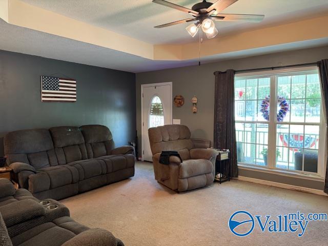 117 Simmons Cir, Fayetteville, TN 37334 - carpeted living area with ceiling fan and a raised ceiling