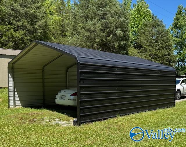 117 Simmons Cir, Fayetteville, TN 37334 - view of vehicle parking featuring a detached carport
