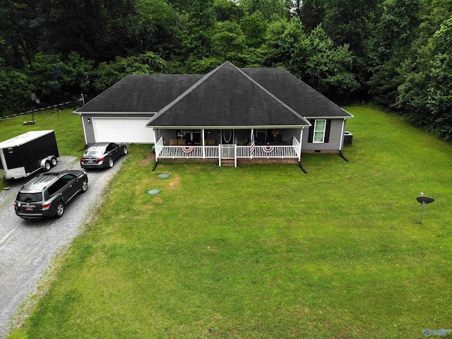 117 Simmons Cir, Fayetteville, TN 37334 - view of front of property featuring driveway, a garage, a porch, a front yard, and a shingled roof