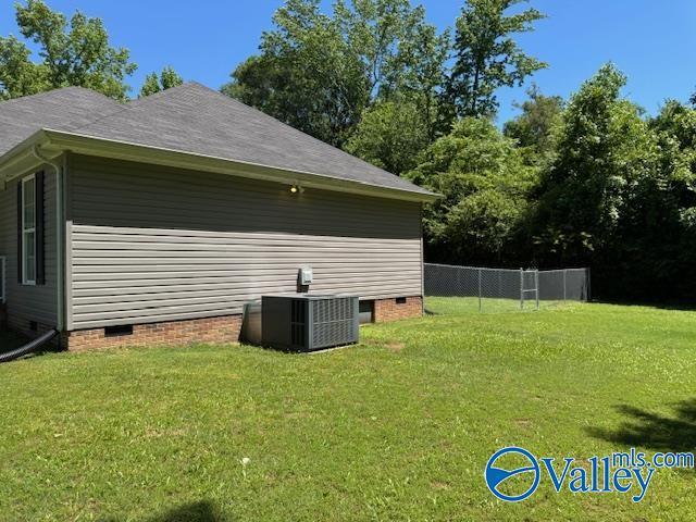117 Simmons Cir, Fayetteville, TN 37334 - view of property exterior featuring crawl space and central AC unit