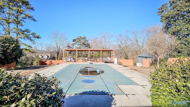 exterior space with a gazebo and a covered pool