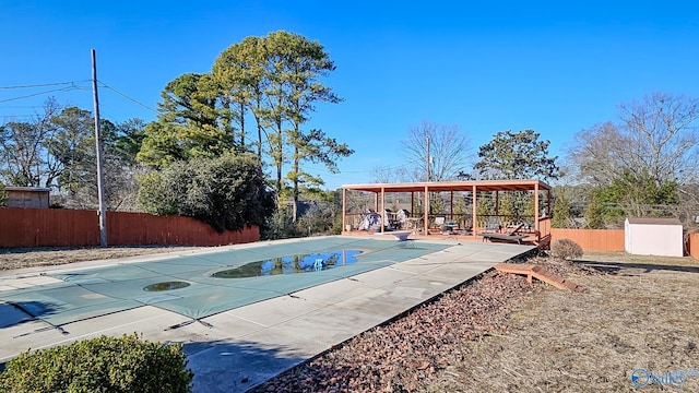 view of swimming pool featuring a patio area