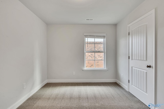 view of carpeted spare room