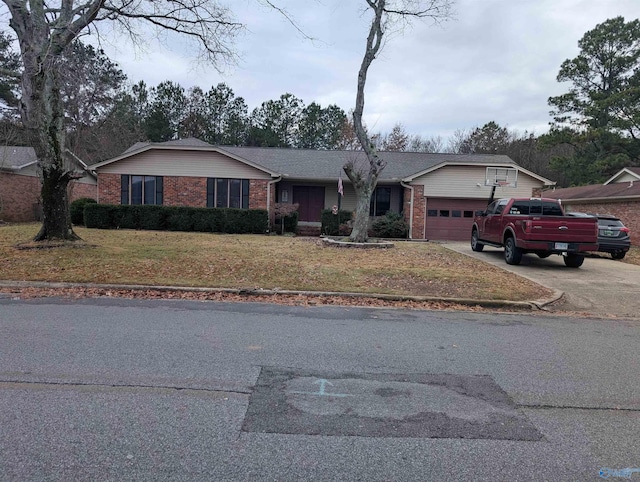 single story home with a garage and a front lawn