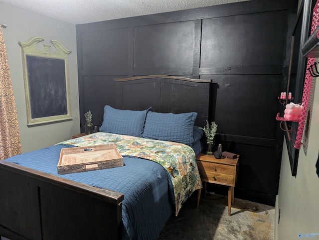 bedroom featuring a textured ceiling