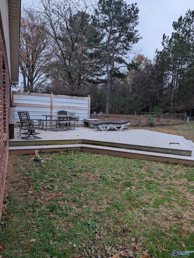 view of yard featuring a wooden deck