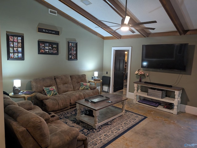 living room with vaulted ceiling with beams, ceiling fan, and a textured ceiling