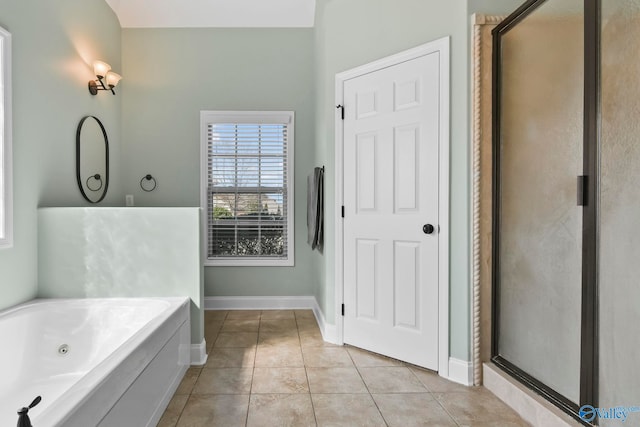 full bathroom with baseboards, a stall shower, a whirlpool tub, and tile patterned flooring