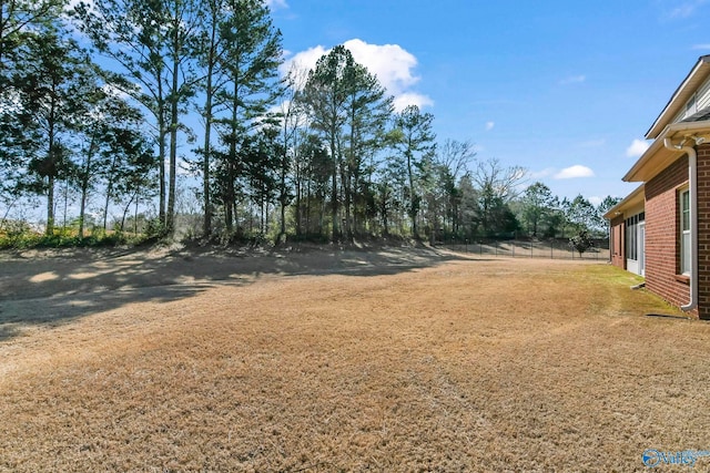 view of yard featuring fence
