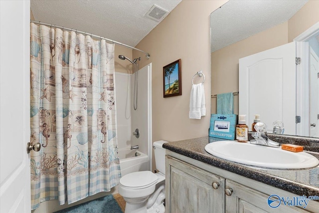 full bath with visible vents, vanity, toilet, a textured ceiling, and shower / bath combo