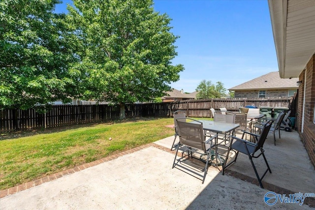 view of patio / terrace with outdoor dining space and a fenced backyard