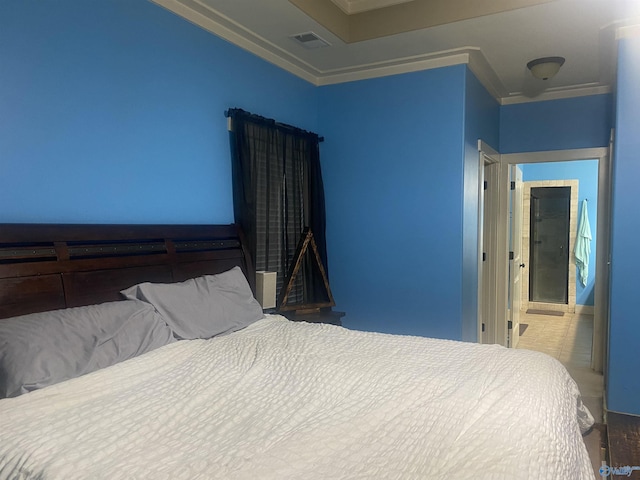 bedroom with visible vents and ornamental molding