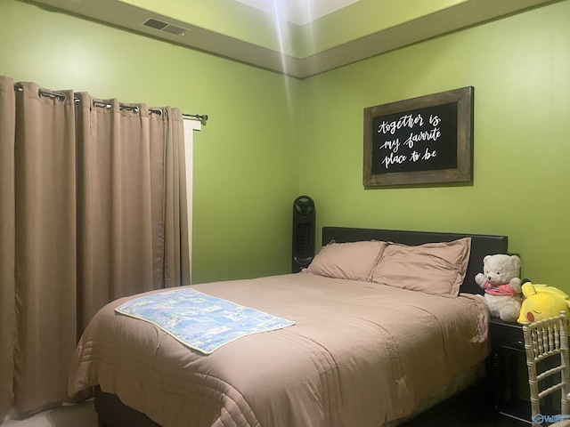 bedroom with visible vents