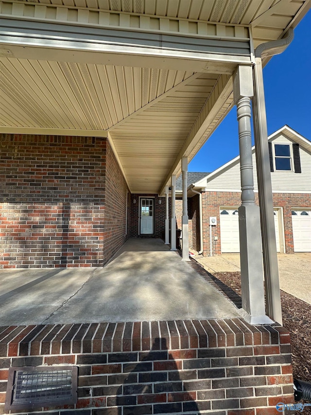 view of patio / terrace with a garage