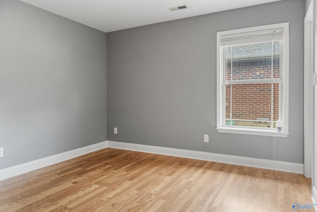 29929 Park Hill Dr, Madison, AL 35757 - empty room featuring light wood finished floors and baseboards