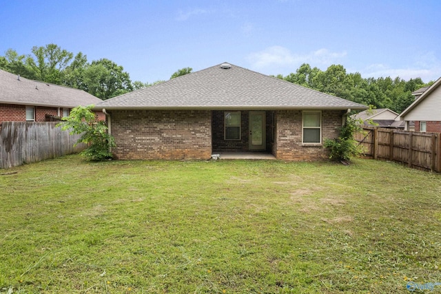 29929 Park Hill Dr, Madison, AL 35757 - back of house with brick siding, a patio area, and a shingled roof