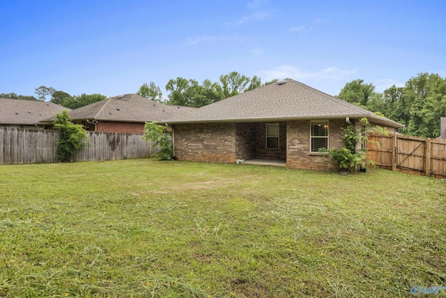 29929 Park Hill Dr, Madison, AL 35757 - back of house featuring brick siding and a patio