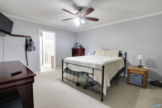 bedroom with ornamental molding, a textured ceiling, baseboards, and carpet floors