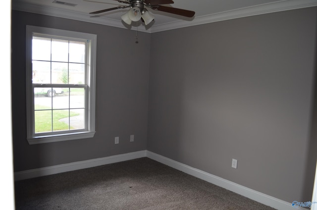 empty room with a ceiling fan, crown molding, baseboards, and dark carpet