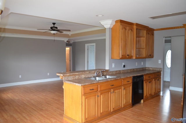 kitchen with a sink, black dishwasher, light wood-type flooring, ceiling fan, and a peninsula