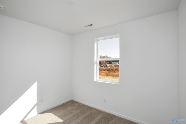 view of carpeted spare room