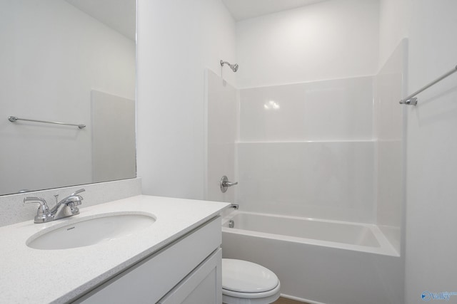 full bathroom with vanity, shower / bathtub combination, and toilet