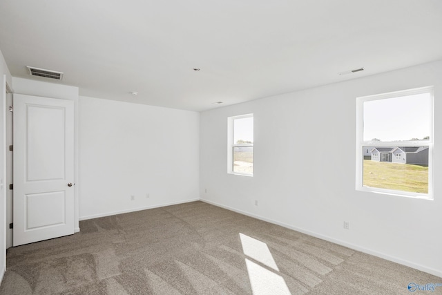 unfurnished room with carpet