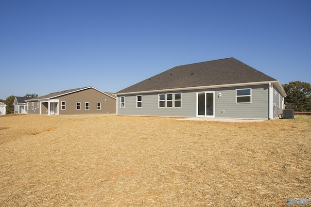 back of house with a patio and central AC