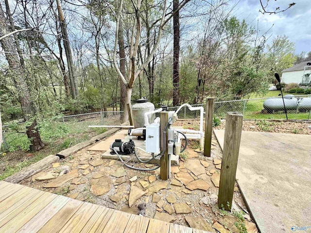 view of patio / terrace featuring fence