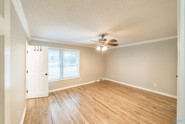 2600 Gawain Rd SE, Huntsville, AL 35803 - empty room featuring crown molding, a ceiling fan, a textured ceiling, and light wood finished floors