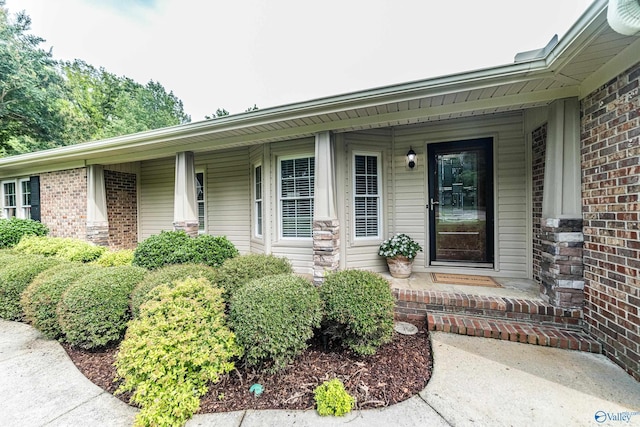 2600 Gawain Rd SE, Huntsville, AL 35803 - entrance to property featuring a porch and brick siding