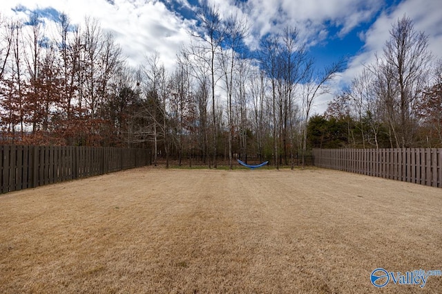 view of yard with fence