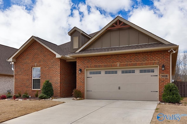 view of front of house with a garage, brick siding, fence, concrete driveway, and board and batten siding