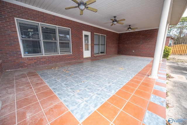 view of patio / terrace with fence and ceiling fan