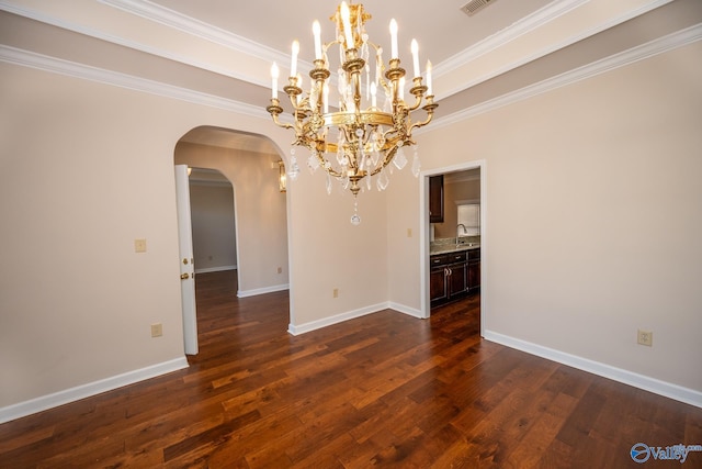 unfurnished dining area featuring baseboards, arched walkways, dark wood-type flooring, and ornamental molding