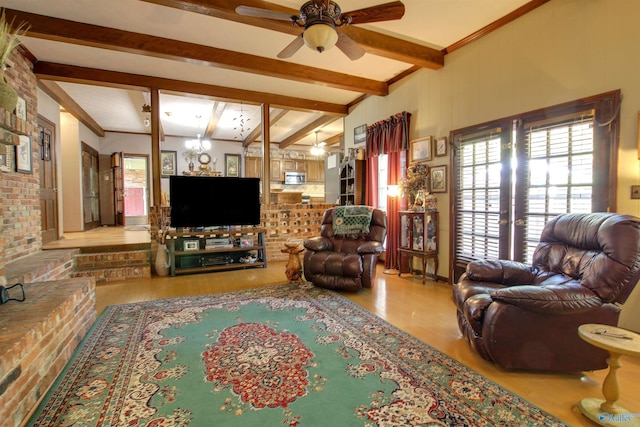8601 County Road 214, Trinity, AL 35673 - living area featuring wood finished floors, a ceiling fan, beamed ceiling, and healthy amount of natural light