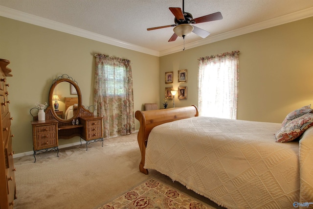 8601 County Road 214, Trinity, AL 35673 - bedroom with light colored carpet, crown molding, ceiling fan, baseboards, and a textured ceiling