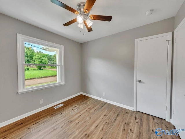 2612 Valley Brook Dr, Huntsville, AL 35811 - unfurnished room featuring wood finished floors, a smoke detector, and ceiling fan