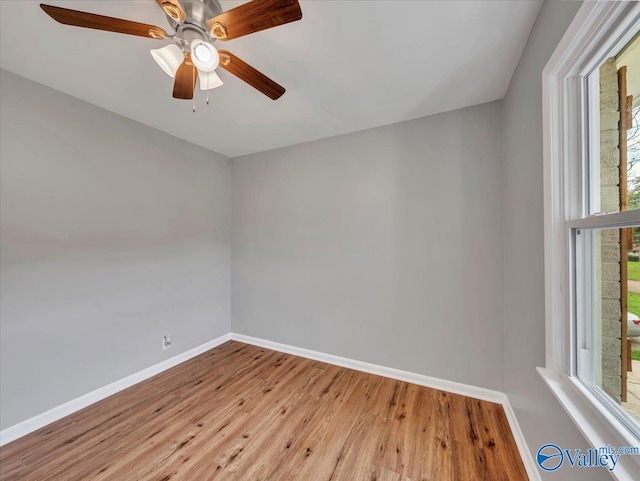 2612 Valley Brook Dr, Huntsville, AL 35811 - spare room with wood finished floors, plenty of natural light, and ceiling fan