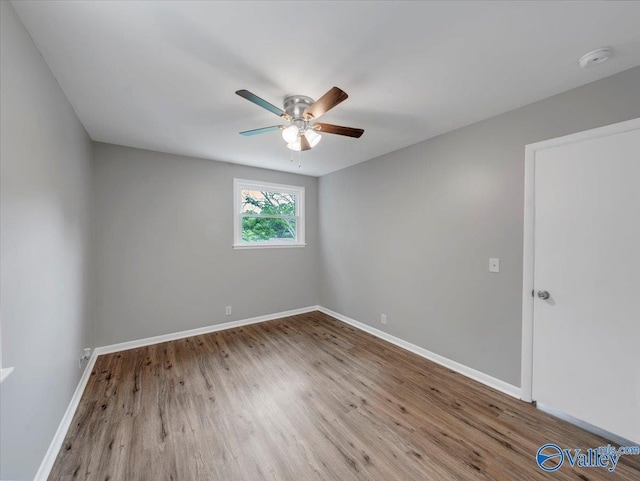 2612 Valley Brook Dr, Huntsville, AL 35811 - spare room featuring a smoke detector, a ceiling fan, and wood finished floors