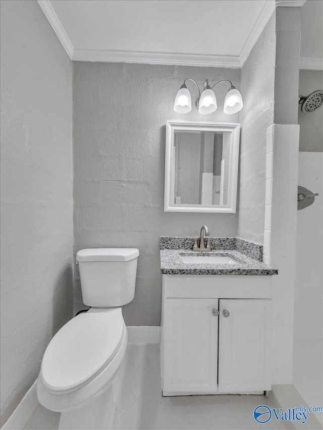 2612 Valley Brook Dr, Huntsville, AL 35811 - bathroom with ornamental molding, vanity, and tile patterned flooring