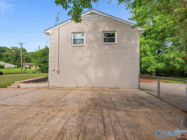 2612 Valley Brook Dr, Huntsville, AL 35811 - view of home's exterior featuring brick siding and a patio area